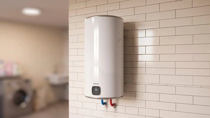 Calentador de agua eléctrico edesa blanco con pantalla digital (55 grados), montado en una pared de azulejos en lavadero.