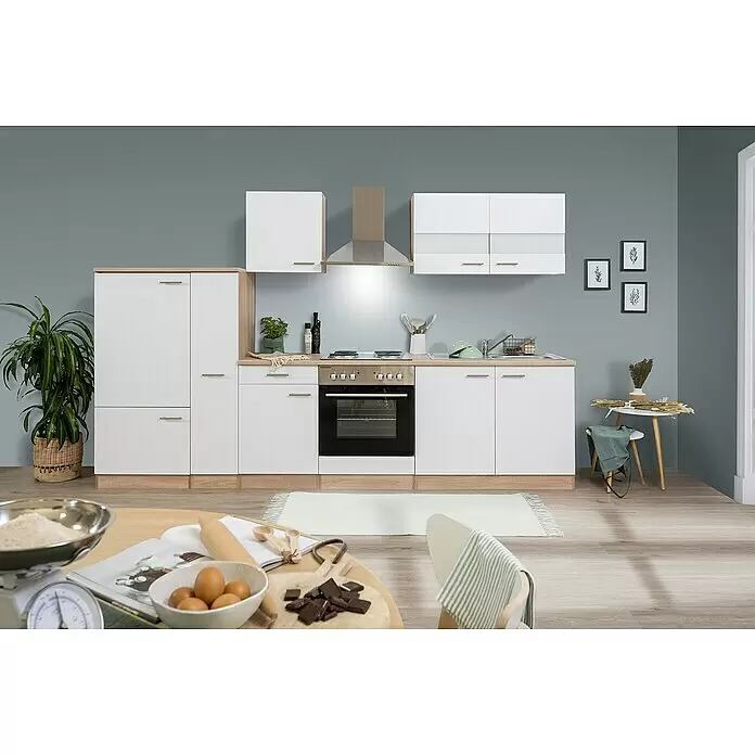 Respekta Küchenleerblock Merle - Breite: 300 cm, Weiß, Ohne Elektrogeräte - Weiße Küchenzeile mit hellen Holzelementen, integriertem Backofen, Kochfeld und Spüle, in einer modernen Küchenumgebung.