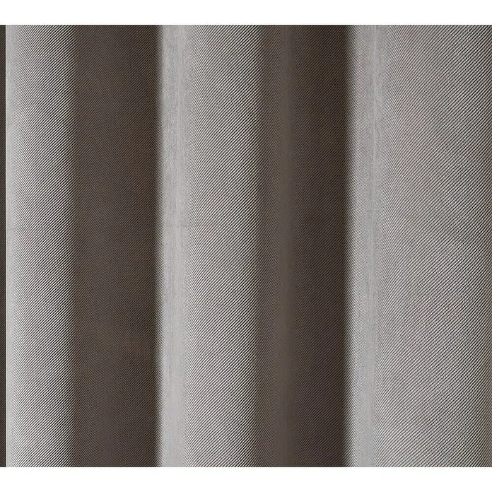 Elbersdrucke Ösenschal Cosy - Grau, 100% Polyester - Detailaufnahme eines grauen Vorhangs mit feiner diagonaler Textur, der sanfte Falten und Schattierungen aufweist.