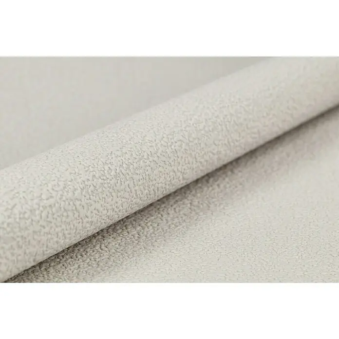 Rasch Vliestapete - Braun/Erdtöne/Taupe, Uni, 10,05 x 0,53 m, Feine Struktur - Nahaufnahme einer Rolle strukturierten, hellgrauen Materials, das sich durch eine unebene, körnige Oberfläche auszeichnet. Ideal für Texturdesign.