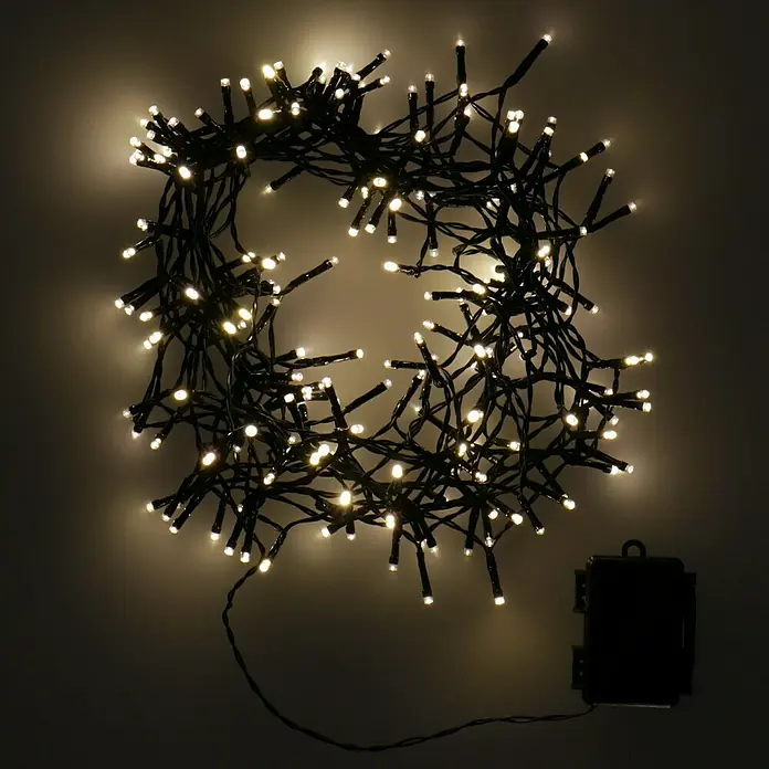 Guirnalda luminosa LED - Para exterior, 15 m, Color de luz: Blanco cálido, Número de bombillas: 192 ud., Funciona con pilas - Vista detallada de micro luces cálidas blancas dispuestas en círculo, ideales para decoraciones festivas y ambiente acogedor.