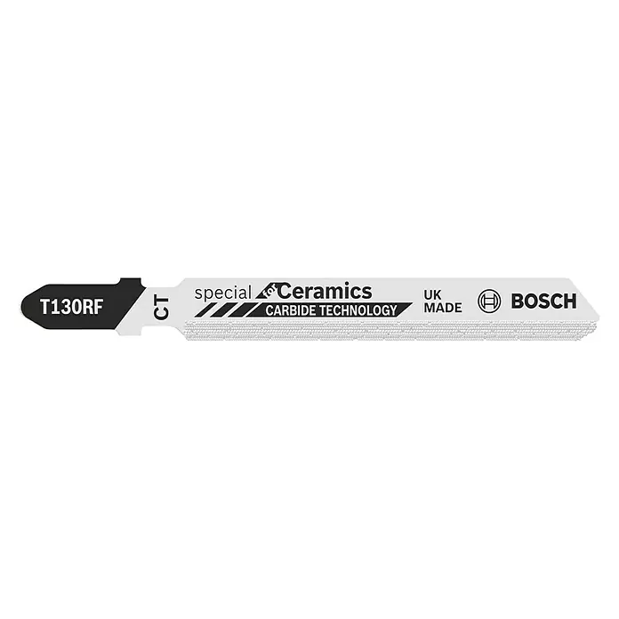 Bosch Hoja metálica dentada T 130 RF - 3 pzs., Vástago en T - La imagen muestra una hoja de sierra de calar Bosch T130RF "Special Ceramics", ideal para cerámica, con tecnología de carburo, fabricada en Reino Unido.