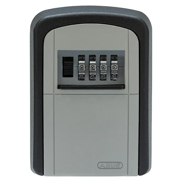 Abus Schlüsselbox Key Garage 707 - Geeignet für: 7 Schlüssel, L x B x H: 39 x 88 x 120 mm, Ohne Bügel - Bild eines ABUS Schlüsselsafe mit vierstelligen Zahlencode. Der Safe ist grau und von einem dunklen Rahmen umgeben.