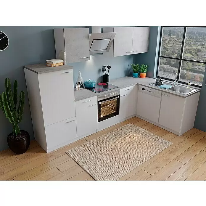 Respekta Winkelküche Malia Typ 3 - B x T x H: 280 x 172 x 200 cm, Weiß/Beton, Mit Elektrogeräten - Moderne L-förmige Küche mit weißen Unterschränken, Arbeitsplatten und Hängeschränken in Betonoptik, hellem Holzboden und Geräten.
