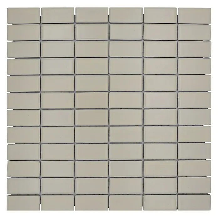Mosaikfliese Stäbchen Uni ST 405 - 29,8 x 29,8 cm, Beige, Matt - Nahaufnahme eines quadratischen Musters aus rechteckigen, cremefarbenen Keramikfliesen mit dunklen Fugen, ideal für Badezimmer und Küchen.