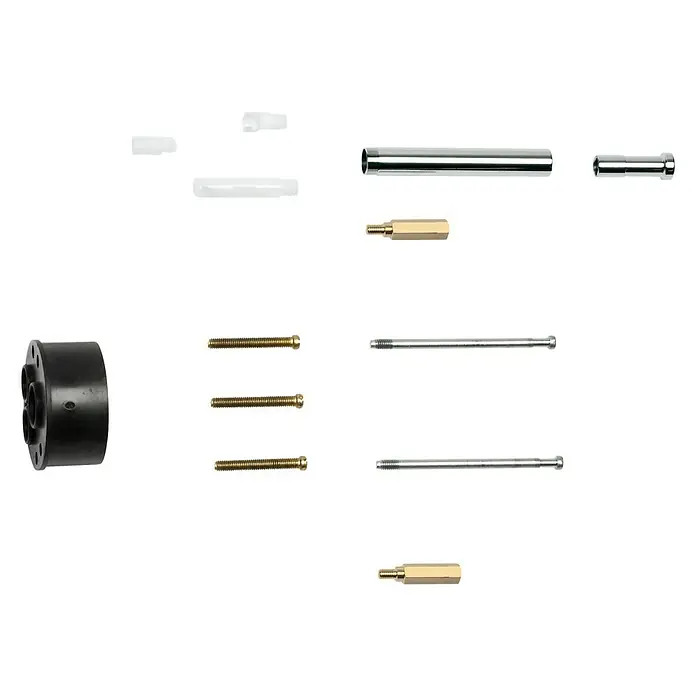 Grohe Verlängerungs-Set - Passend für: Grohe Unterputz-Universal-Armatur 1/2", Durchmesser: 25 mm - Ein detailliertes Bild von diversen Einzelteilen, darunter ein schwarzes Gehäuse und diverse Metallstifte und Rohre.