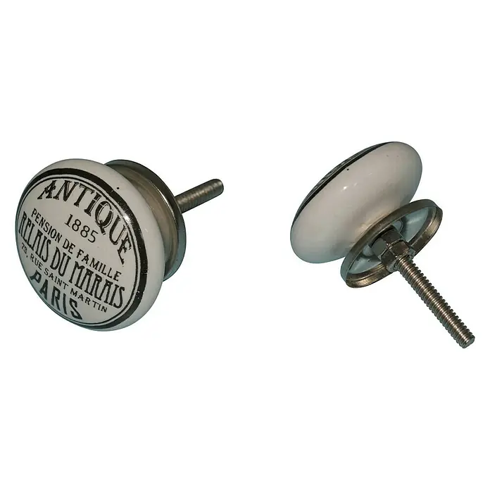 Möbelknopf TR-26 - Typ Möbelgriff: Knopf, Durchmesser: 39 mm, Braun/Weiß - Nahaufnahme von zwei dekorativen Möbelknöpfen im Vintage-Stil mit der Aufschrift "Antique Relais du Marais Paris".