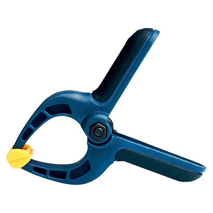 Rapid Zwingen-Set - 5 Stk. - Eine blaue Federklemme mit gelben Enden, ein nützliches Werkzeug zum Fixieren von Objekten. Ideal für Hobby, Handwerk und den Einsatz in der Werkstatt.