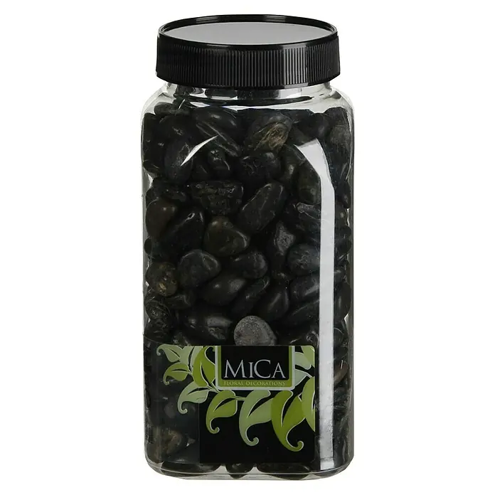 Piedras decorativas - Negro, Tamaño de grano: Ø 8 - 25 mm, 1 kg - Recipiente de vidrio lleno de piedras de MICA Floral Decorations, perfecto para decorar arreglos florales y como un atractivo elemento de diseño.