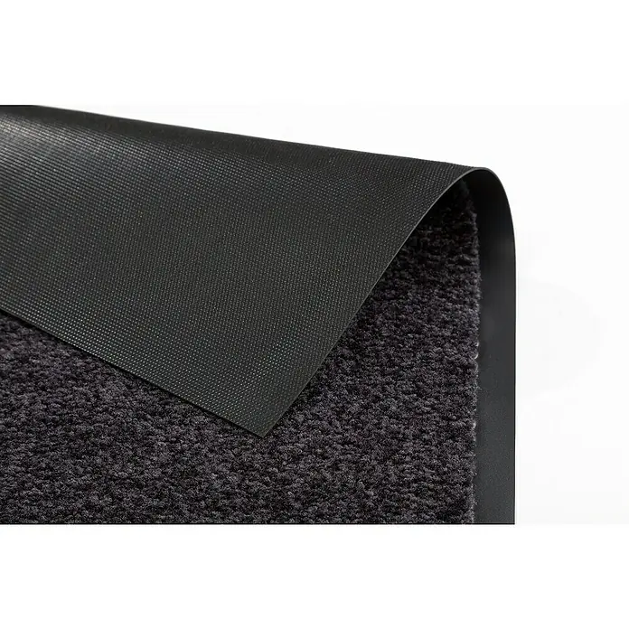 Astra Schmutzfangmatte Proper Tex - Schwarz, 60 x 180 cm, Material Nutzschicht: 100 % Polyamid - Nahaufnahme einer grauen Fußmatte mit rutschfester Unterseite. Ideal für Eingangsbereiche, um Schmutz und Feuchtigkeit fernzuhalten.