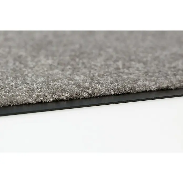 Astra Schmutzfangmatte Proper Tex - Grau, 60 x 180 cm, Material Nutzschicht: 100 % Polyamid - Nahaufnahme einer grauen Fußmatte mit schwarzer Unterseite, ideal für den Innenbereich und zur Schmutzaufnahme.