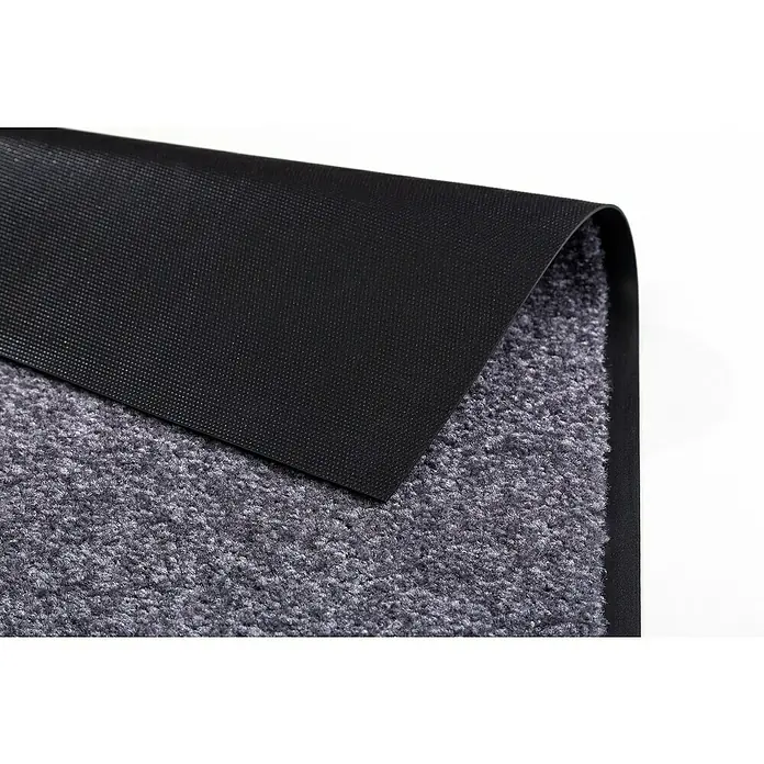 Astra Schmutzfangmatte Proper Tex - Blaugrau, 250 x 90 cm, Material Nutzschicht: 100 % Polyamid - Nahaufnahme einer grauen Fußmatte mit einer schwarzen, rutschfesten Unterseite, ideal für den Innenbereich.
