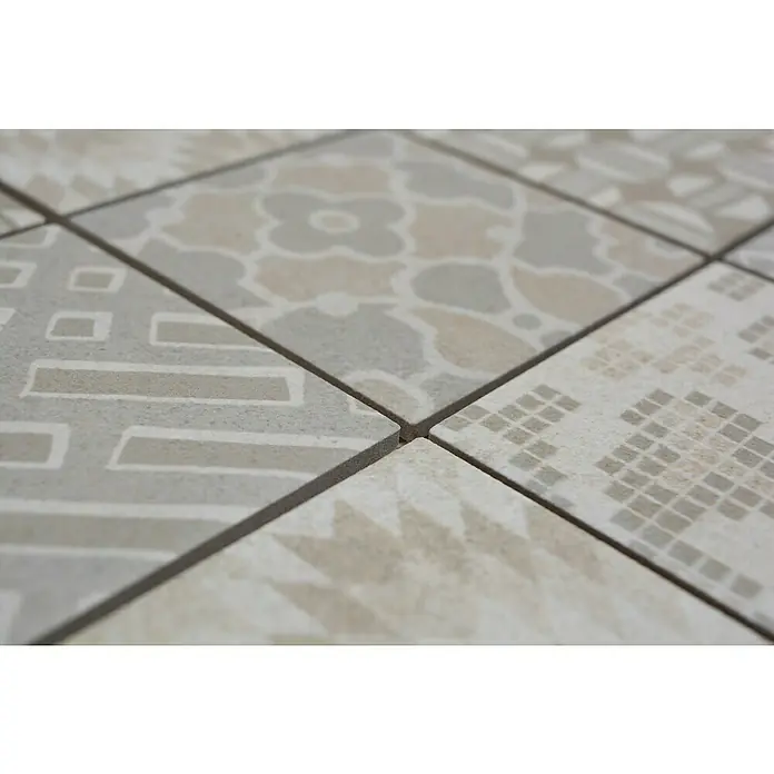 Mosaikfliese Quadrat Pico B - 29,8 x 29,8 cm, Grau, Matt - Nahaufnahme von gemusterten Bodenfliesen in verschiedenen Designs, die ein dekoratives und stilvolles Interieur-Element darstellen.