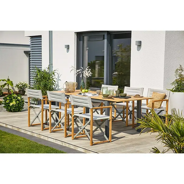 Sunfun Gartenmöbel-Set Carina/Kathrin - 7 -tlg., Akazie/Stahl/Polyesterfaser, Teakbraun/Anthrazit/Hellgrau, Tischplatte ausziehbar - Ein einladender Außenbereich mit einem stilvollen Gartentisch und bequemen Stühlen für Mahlzeiten im Freien.