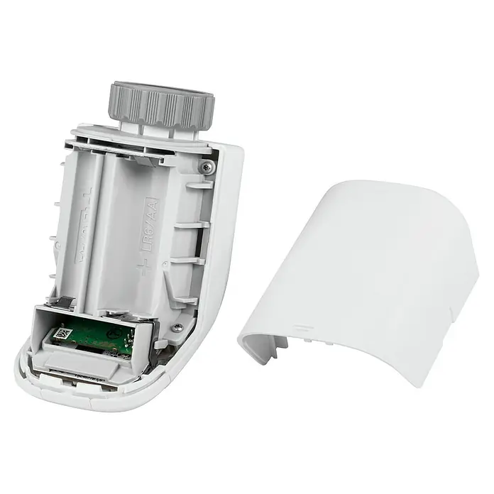 Homematic IP Starter-Set Heizen HmIP-SK16-21 Access Point & 2 Heizkörper-Thermostate basic - Ein offenes Thermostatgerät mit Batteriefach und abgenommener Abdeckung, das die interne Elektronik und das Batteriefach für LR6/AA Batterien zeigt.