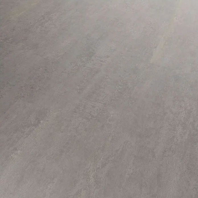 b!design Vinylboden SPC - Udine, Fliese, 609,6 x 304,8 x 3,8 mm - Nahaufnahme eines grauen Bodenbelags mit feiner Textur, ideal für moderne Innenräume.
