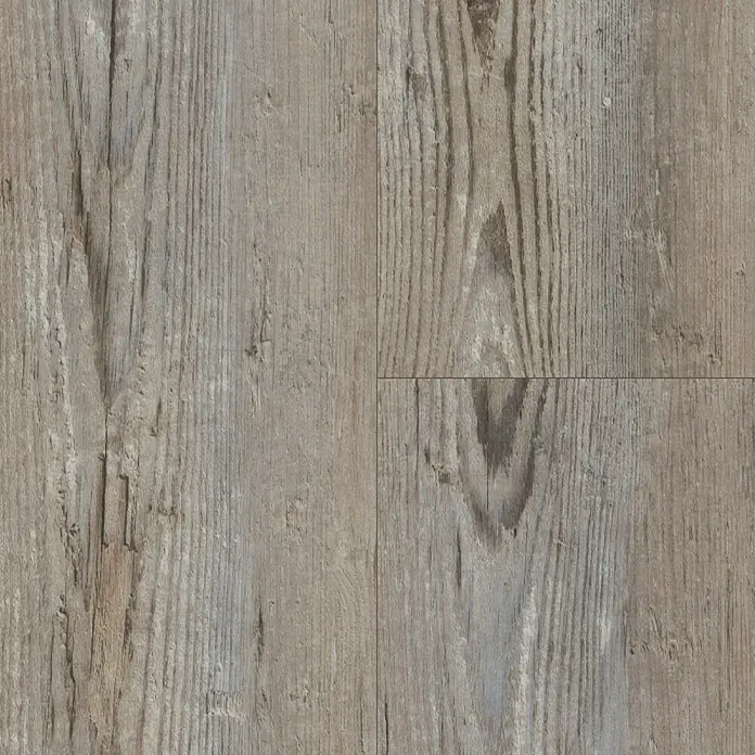 Fixed Vinylboden - Graukiefer, Landhausdiele, 1.219 x 184 x 2,5 mm - Ein detaillierter Blick auf hochwertigen Holzfußboden mit einer markanten Maserung und warmen Farbtönen, ideal für ein gemütliches Ambiente.