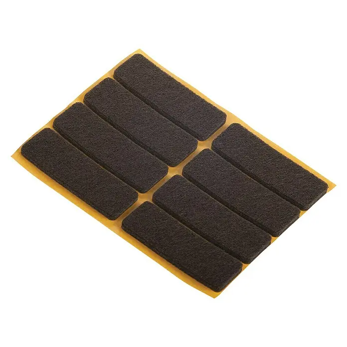Fix-o-moll Protector para muebles - L x An: 16 x 44 mm, Cuadrado, Marrón, 8 ud. - Una lámina con múltiples almohadillas rectangulares oscuras para muebles para proteger los pisos de rayones.