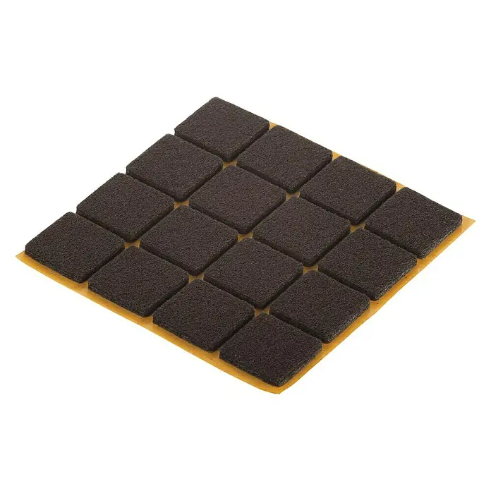 Suki Patín antideslizante para alfombras - Diámetro: 22 mm, Marrón, Pegado, An x Al: 22 x 22 mm, 16 ud. - Almohadillas marrones autoadhesivas para muebles sobre una hoja de soporte amarilla. Ideal para proteger los pisos.