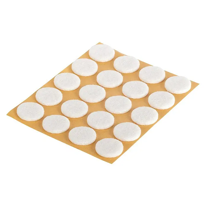 Fix-o-moll Filzgleiter - Durchmesser: 17 mm, Kleben, 20 Stk., Weiß - Blatt mit mehreren weißen Möbelgleitern. Ideal zum Schutz von Böden vor Kratzern und Beschädigungen durch Möbel. Praktisch für jedes Zuhause.