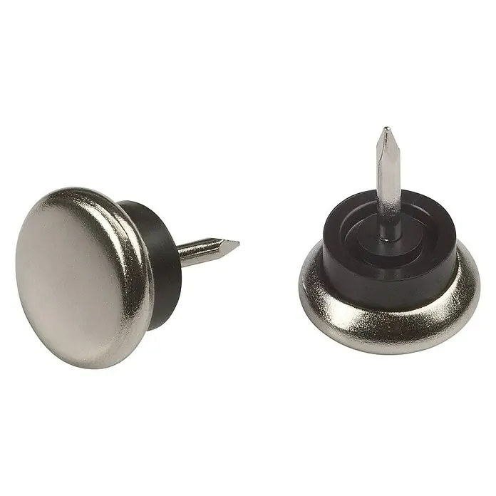 Suki Taco de teflón para patas con clavo - Diámetro: 18 mm, Acero, 8 ud. - Primer plano de dos deslizadores de muebles con clavo, diseñados para ser clavados en la parte inferior de las patas.