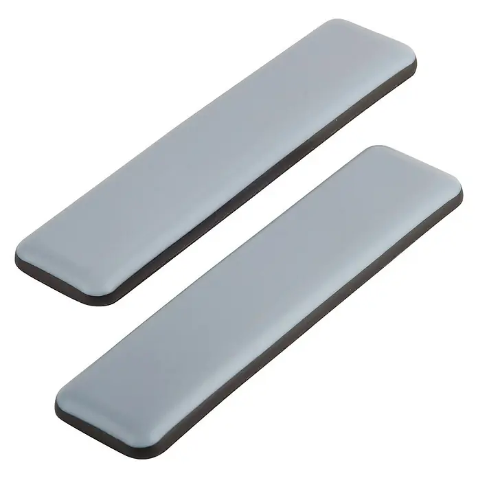 Fix-o-moll Möbelgleiter - B x L: 100 x 25 mm, 2 Stk. - Zwei rechteckige, graue Gleiter mit abgerundeten Ecken und dunklem Rand für Möbel.