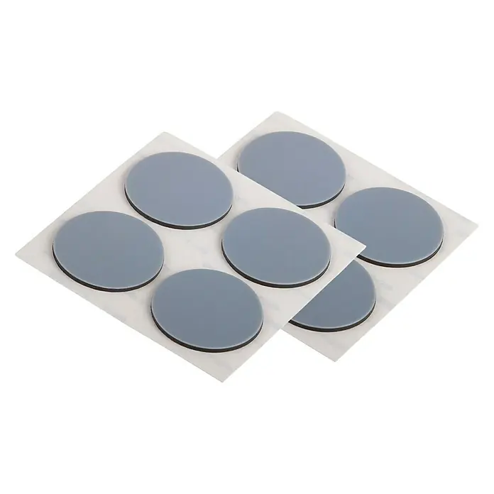 Suki Protector para muebles - Diámetro: 28 mm - Dos blisters de deslizadores de muebles redondos grises con borde negro sobre papel de soporte blanco. Ideal para proteger muebles y suelos.