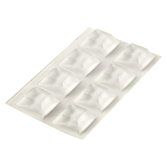 Fix-o-moll Rutsch- & Lärmstopper - L x B: 20 x 20 mm, Kleben, 8 Stk. - Eine weiße Pralinenform mit acht pyramidenförmigen Vertiefungen, ideal für die Herstellung einzigartiger Süßigkeiten.