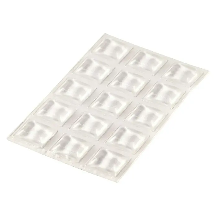 Fix-o-moll Rutsch- & Lärmstopper - L x B: 13 x 13 mm, Kleben, 15 Stk. - Ein weißer Blisterpack mit quadratischen Gelkissen, ideal für medizinische Zwecke oder zur Polsterung. Praktisch und hygienisch.
