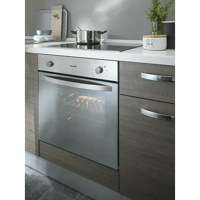 Marinelli Cucine Vormontierte Küchenzeile Rita - Breite: 195 cm, Eiche Grau, Mit Elektrogeräten - Einbauherd von Candy in einer modernen Küche, der mit seinem schlichten Design und der Edelstahloberfläche überzeugt. Perfekt für kulinarische Genüsse.