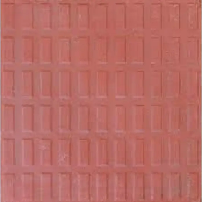 BHS Madrid Loseta de exterior Panot - Rojo, Granito - Primer plano de adoquines texturizados marrón rojizo.