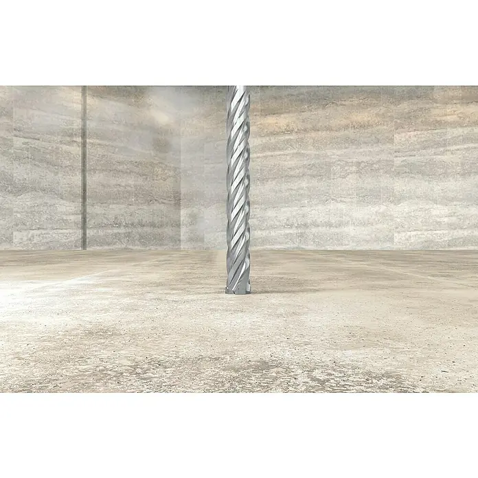 Fischer Taco de anclaje para cargas pesadas FSL 8 - Ø x L: 6 x 45 mm, 4 ud. - Primer plano de un tornillo para hormigón con ranuras en espiral sobre un suelo de hormigón, delante de una pared de hormigón.