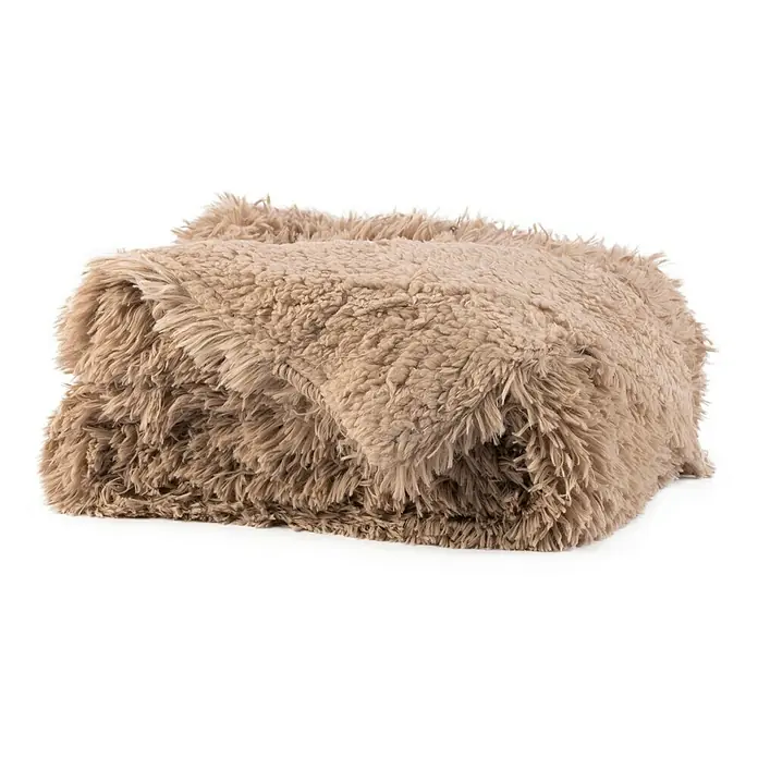 Manta para sofá Luxury - Multicolor - Primer plano de una manta esponjosa doblada en un suave tono beige, que muestra una textura acogedora y atractiva.