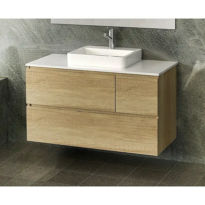 Artysan Mueble bajo de lavabo Tina Paris - An x Pr x Al: 120 x 46 x 64 cm, Nature - Primer plano de un tocador con cajones de madera, encimera blanca y lavabo cuadrado en un baño.