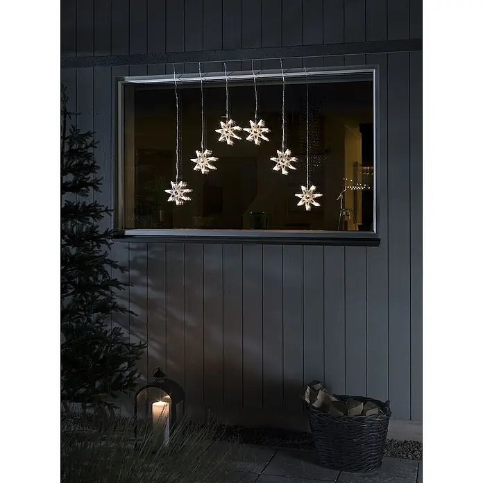 Konstsmide LED-Lichtervorhang Sterne - Länge: 90 cm, Lichtfarbe: Warmweiß, Anzahl Leuchtmittel: 48 Stk., Netzbetrieben, IP44 - Eine festliche Fensterdekoration mit leuchtenden Sternenlichtern, die eine warme und einladende Atmosphäre schaffen. Perfekt für die Weihnachtszeit.