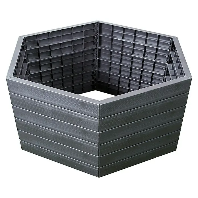 Garantia Huerto Ergo XL Wood - Ø x Al: 145 x 25 cm, Plástico, Gris - En la imagen se muestra un arriate elevado hexagonal hecho de plástico gris con listones horizontales. En el interior tiene una estructura reticular.