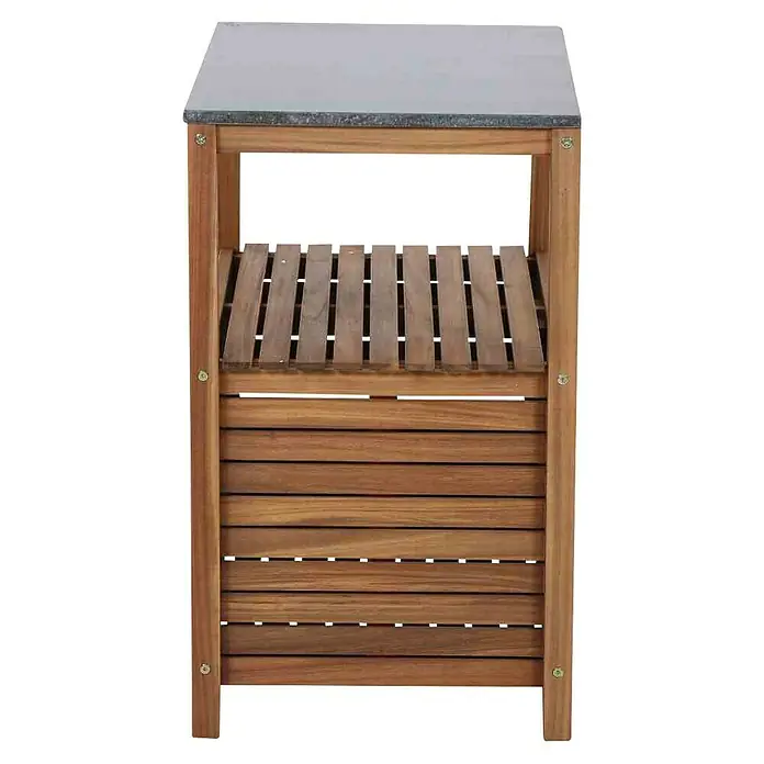 Siena Garden Outdoorküchen-Modul Riva - Mittelteil mit Tür, B x T x H: 75 x 52 x 87 cm, Akazienholz/Granit, Natur/Dunkelgrau - Eine stilvolle Holzkommode mit einer grauen Platte, perfekt für zusätzlichen Stauraum und als dekoratives Element im Raum.