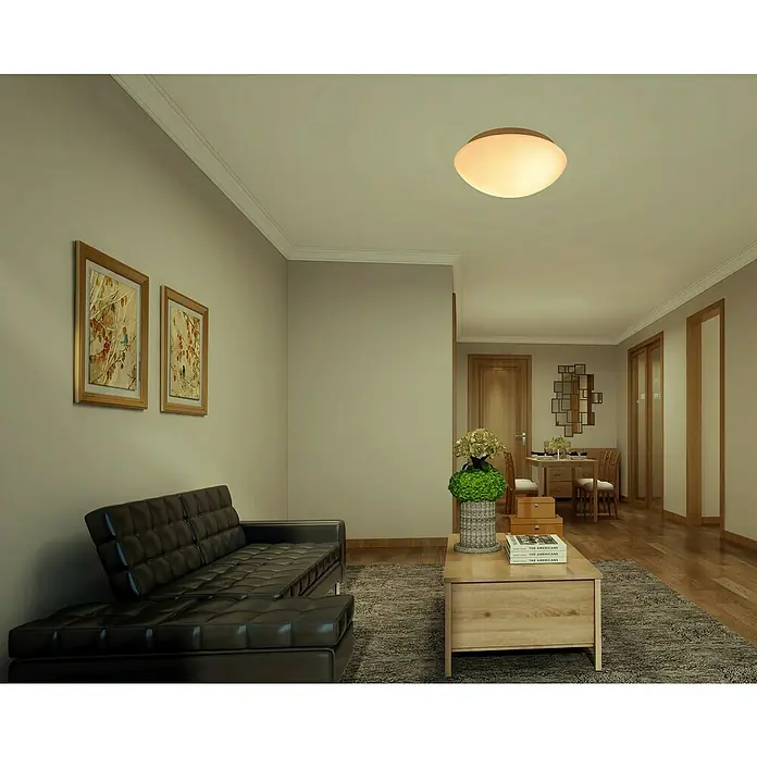 Tween Light Deckenleuchte rund Taviano - 80 W, Ø x H: 300 mm x 12 cm, Weiß - Elegantes Wohnzimmer mit modernem Deckenlicht, das den Raum sanft erhellt. Ein stilvolles Möbelarrangement rundet das Ambiente ab.