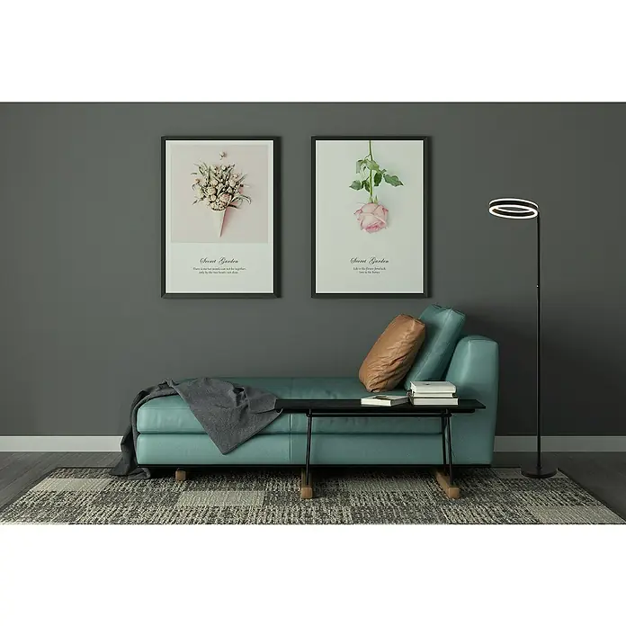 Lavida Ring LED-Stehleuchte - Höhe: 180 cm, Schwarz, Warmweiß - Eine moderne Inneneinrichtung mit stilvollem Sofa, minimalistischem Beistelltisch, auffälliger Stehlampe und dekorativen Wandbildern.
