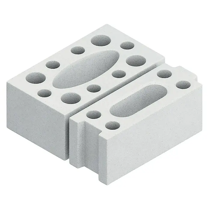 Bosch Beton- & Steinbohrer MAX-4 - 1 Stk., Durchmesser Bohrer: 25 mm - Zwei weiße Ziegelsteine mit Löchern unterschiedlicher Größe für den Bau, die eine hohe Stabilität und Wärmedämmung gewährleisten.