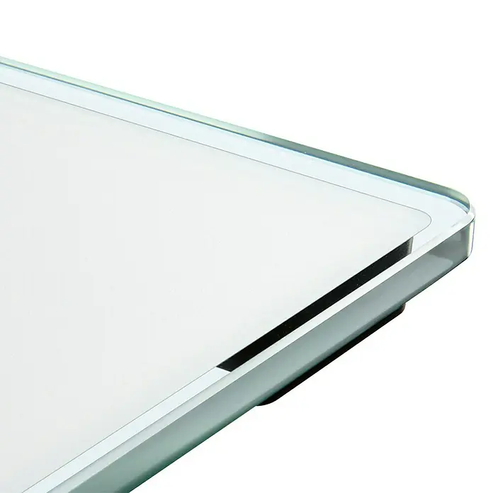 Báscula digital Style Sense Comfort 100 - 31 x 31 x 2 cm, Vidrio, Blanco - Primer plano de un elegante panel de vidrio con bordes redondeados y una superficie clara e impecable.