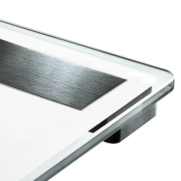 Báscula digital Shape Sense Connect 100 - 32 x 32 x 2,6 cm, Vidrio, Blanco - Primer plano de una báscula digital con placa metálica plateada y bordes transparentes.