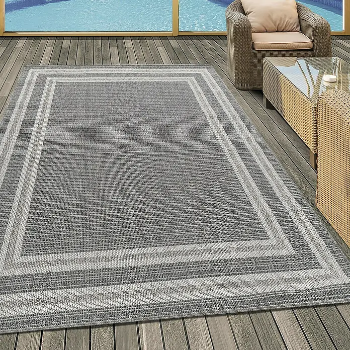 Outdoor-Teppich Aruba 4901Grau, 230 x 160 cm, 100% Polypropylen - Dieser Teppich in Grau und Weiß mit schlichtem Randmuster verleiht jedem Außenbereich Stil und Komfort. Er ist wetterfest und pflegeleicht.