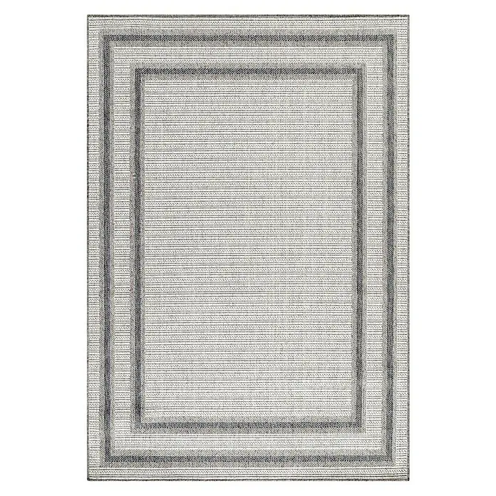 Outdoor-Teppich Aruba 4901 - Cream, 290 x 200 cm, 100% Polypropylen - Nahaufnahme eines stilvollen, grauen Outdoor-Teppichs mit modernem, gerahmtem Design, ideal für jede Terrasse oder Garten.