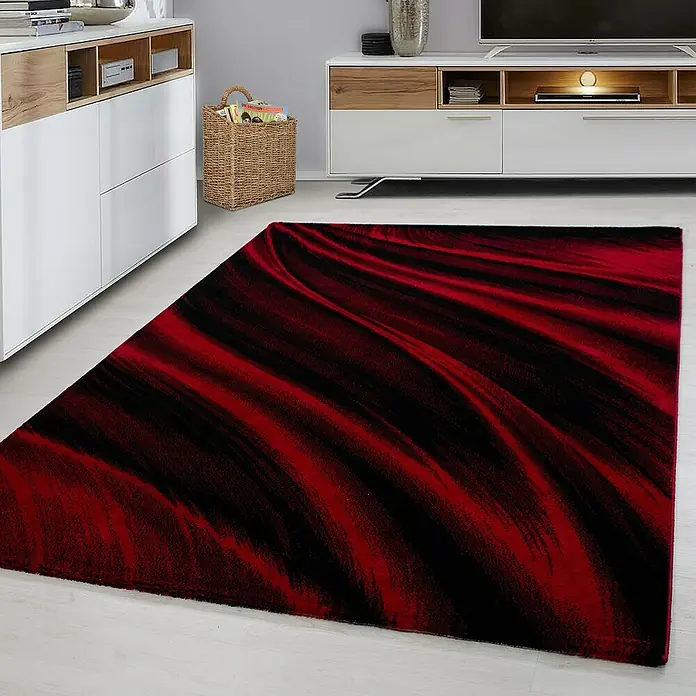 Kurzflorteppich Miami 6630Rot, 150 x 80 cm, 100% Polypropylen - Ein auffälliger Teppich in Rot- und Schwarztönen mit einem wirbelnden Muster, das jedem Raum einen modernen Touch verleiht.