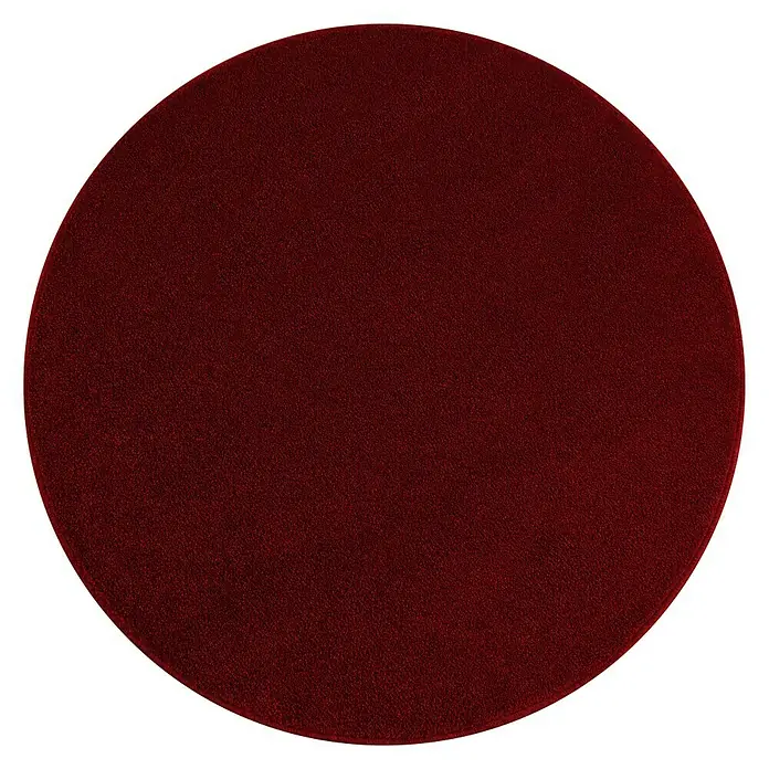 Kurzflorteppich Ata 7000 - Rot, Durchmesser: 200 cm, 100 % Polypropylen - Dunkelroter Teppich in Kreisform mit deutlicher Textur vor schwarzem Hintergrund, der Wärme und Komfort ausstrahlt.