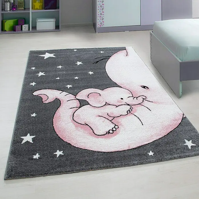 Kinderteppich Kids 0560 - Pink, 200 x 140 cm, 100 % Polypropylen - Ein grauer Teppich mit einem rosa Elefantenmotiv und Sternen, perfekt für ein Kinderzimmer.