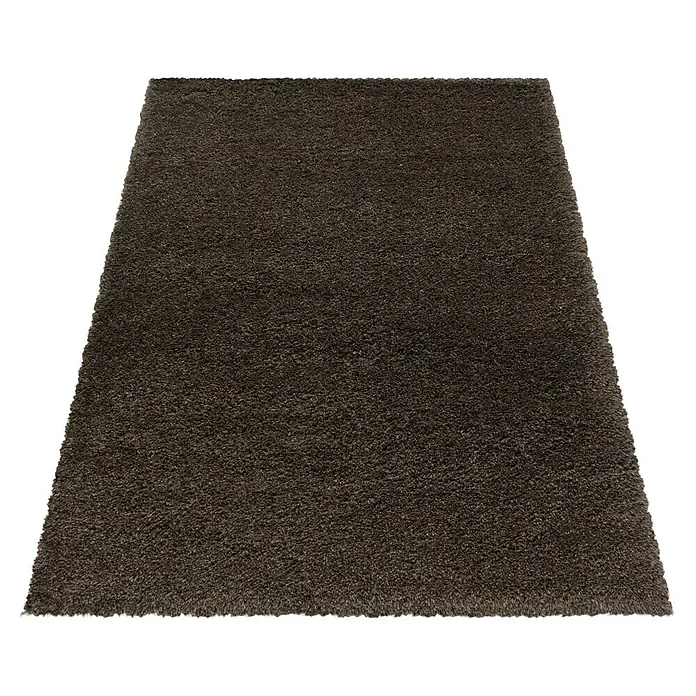 Hochflorteppich Fluffy 3500 - Braun, 200 x 140 cm, 100 % Polypropylen - Ein detailreiches Bild eines braunen Teppichs, das die Textur und Farbe des Produkts hervorhebt.