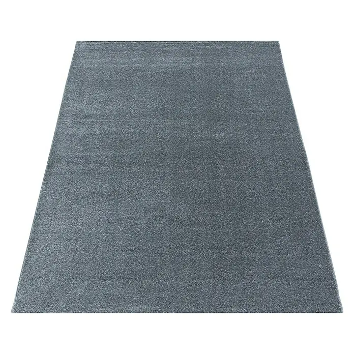 Hochflorteppich Rio 4600 - Silber, 150 x 80 cm, 100% Polypropylen - Rechteckiger grauer Teppich mit subtiler Textur vor einem neutralen Hintergrund, ideal für moderne Wohnräume und Büros.