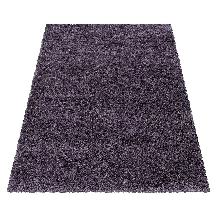 Hochflorteppich Sydney 3000 - Violett, 230 x 160 cm, 100% Polypropylen - Nahaufnahme eines rechteckigen, hochflorigen Teppichs in dunklem Lila, der eine weiche und luxuriöse Textur zeigt.